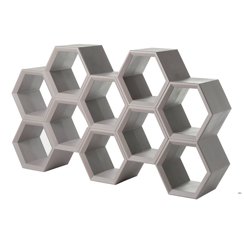 Taeke Halman suunnittelema sulavalinjainen HEXA design hyllykkö Dove Grey värillä.